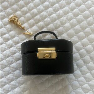 Elegant Black Jewelry Case with Gold Accents